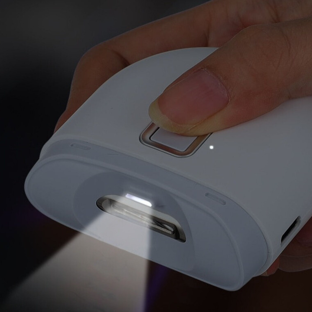 Elektrisk nagelklippare med lampa