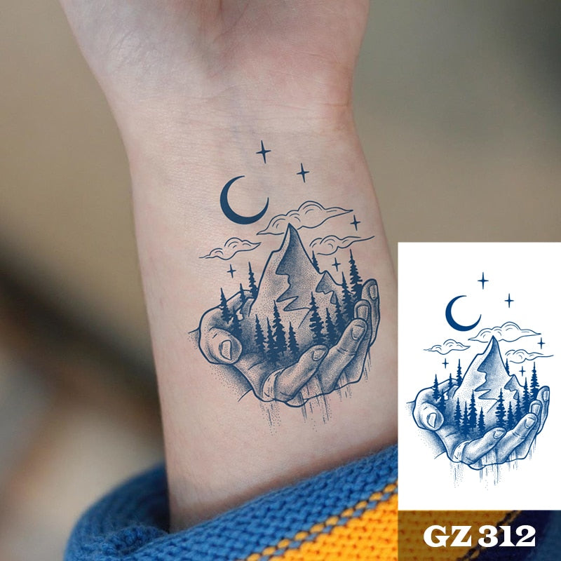 Temporär tatuering : hand, berg